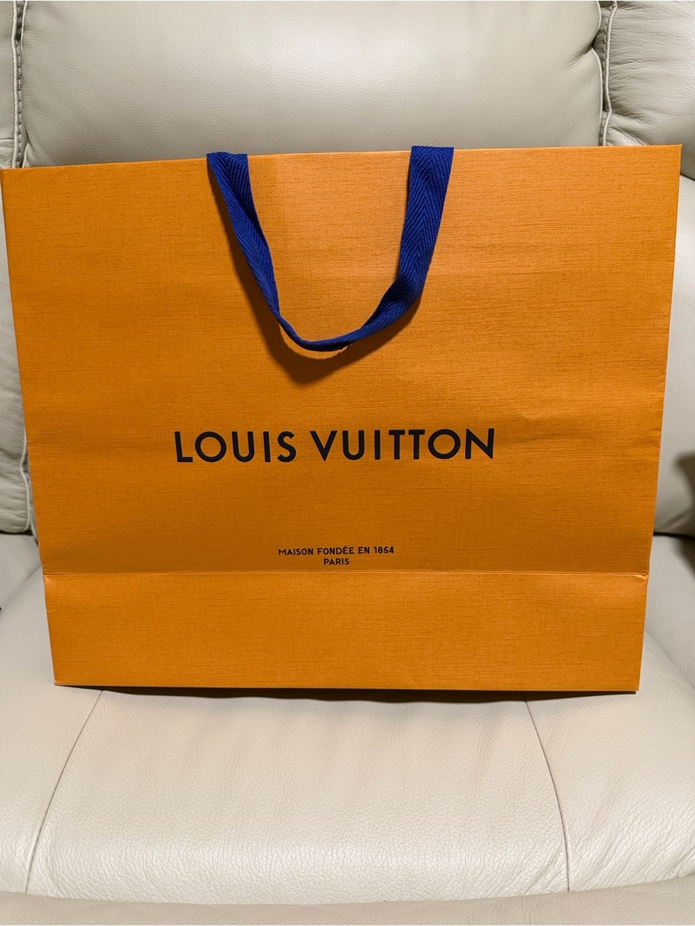 Louis Vuitton Orange Shopping Bag with Blue Handles: